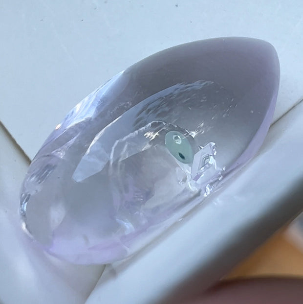 Polished Amethyst With Moving Petroleum Inclusion
