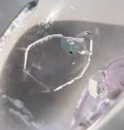 Polished Amethyst With Moving Petroleum Inclusion