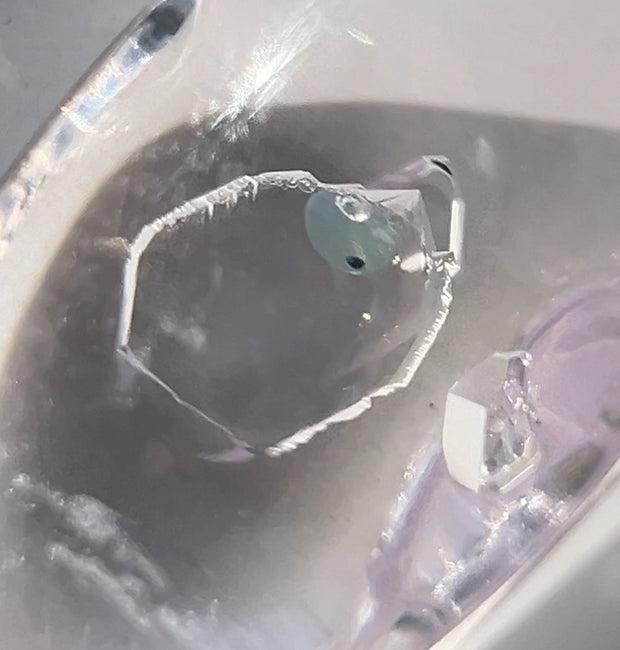 Polished Amethyst With Moving Petroleum Inclusion
